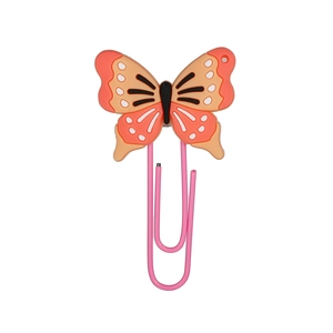 Detail of a cute orange butterfly paperclip with pink metal finish and PVC butterfly wings