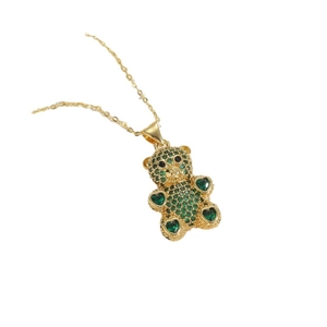 Sparkling gold necklace with green zircon teddy bear pendant featuring heart-shaped stones