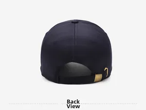Detail view of the navy blue cotton baseball cap featuring an adjustable brass metal buckle
