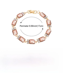 Detail of pink crystal sugar bracelet in gold alloy with small diamond accents