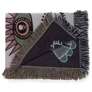 Bohemian woven cotton picnic blanket with colorful evil eye pattern and fringe details