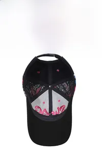 Close-up of baseball cap interior with pink embroidery and colorful geometric lining