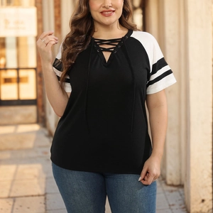 Detail of plus size V-neck T-shirt showing lace-up closure and contrast striped sleeves