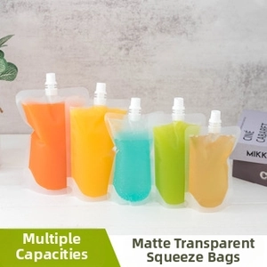 Detailed view of matte transparent liquid pouches with white screw caps in multiple sizes