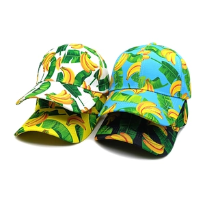 Banana and leaf print baseball caps in black, white, blue, and yellow cotton fabric