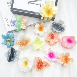 Gradient floral hair claws in multiple colors for stylish beach vacation hair styling