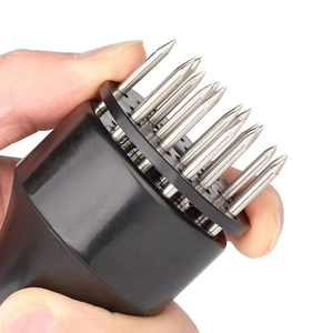 Handheld stainless steel meat tenderizer tool with black handle and sharp needles