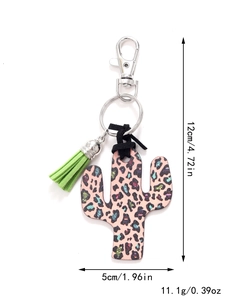 Detailed view of cactus keychain with leopard print, green tassel and dimensions info