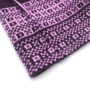 Purple and black geometric jacquard knit Christmas hat with soft pompom for winter warmth