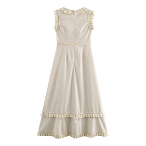 Robe longue beige sans manches à col en V avec détails de franges et style bohème