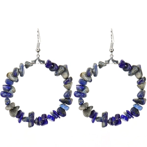 Detail of bohemian hoop earrings with irregular blue lapis and grey natural stone beads