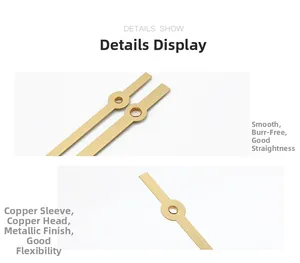 Detailed close-up showing smooth gold-plated copper clock hands with precise metal texture