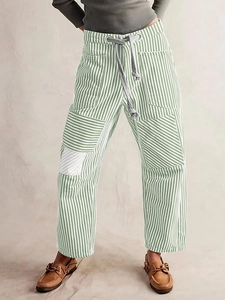 Women's green and white vertical striped wide-leg trousers with drawstring waist and pockets