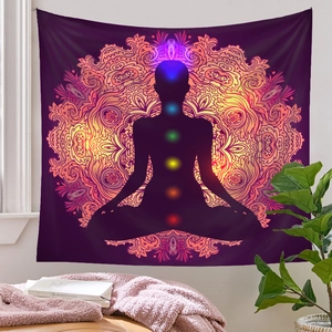 Detail of purple Seven Chakras Yoga Tapestry with golden Mandala and meditation silhouette