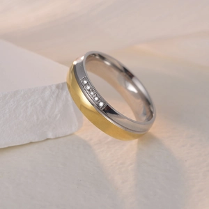 Two-tone titanium steel couple ring with six micro-set zircons and asymmetric design