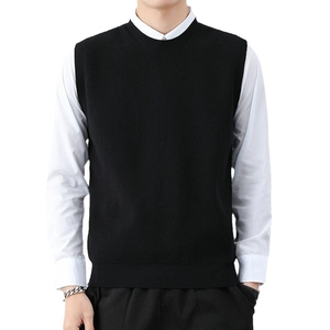 Minimalist black knitted sweater vest for men featuring a classic round neck design