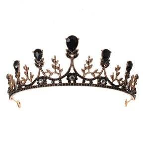 Vintage bridal crown with black crystals and bronze metal leaf design on white background