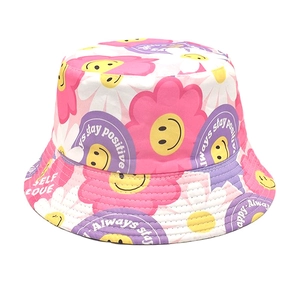 Bright reversible bucket hat with smiling sunflowers and positive self love quotes