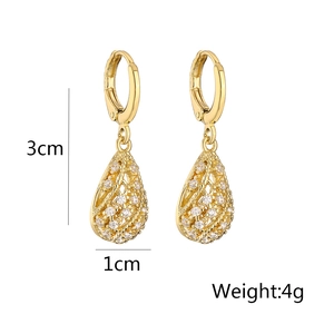 Detail showing 3cm drop earrings with 18K gold plating and sparkling cubic zirconia