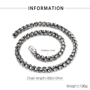 Detailed view of vintage gothic skull chain necklace in antique silver stainless steel