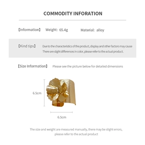 Detailed specs of the gold flower cuff bracelet showing alloy material and 65.4g weight