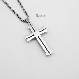 Reverse side detail of triple-layer cross pendant in brushed steel with box chain