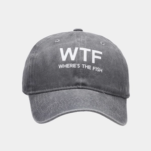 Close-up of washed grey cotton baseball cap featuring WTF heat transfer printing detail