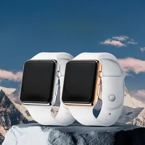 Outdoor sport smart watch with white silicone band on rugged snow mountain background