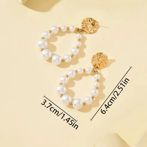 Elegant gold drop earrings with hammered metal discs and pearl hoop dangles for women