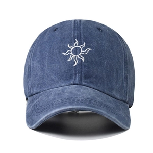 Vintage washed navy denim baseball cap with white sun embroidery and six-panel design