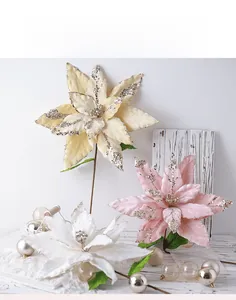 Close-up of artificial Poinsettia flowers with silver glitter edges for Christmas decor
