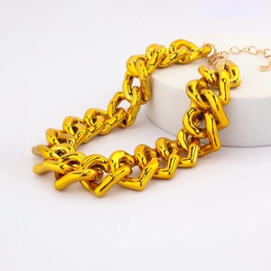 Macro detail of adjustable gold hip hop pet necklace with chunky link chain on white prop