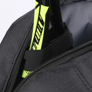 Detail of sports bag with honeycomb texture, zipper and velcro strap for racket storage