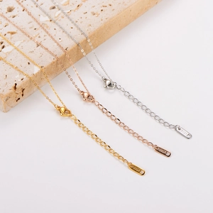 Detailed view of 18KGP stainless steel infinity necklaces in gold, rose gold and silver