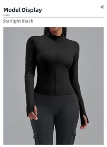 Détail de la veste de sport noire cintrée avec passe-pouces et fermeture à glissière