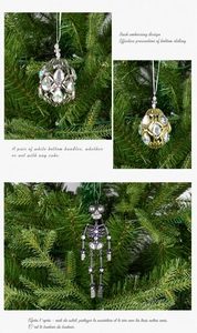 Close-up of sparkling acrylic crystal cross charms hanging on green Christmas tree branches