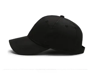 Detail view of black breathable baseball cap featuring red side logo embroidery