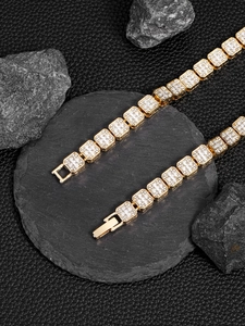 Detailed close-up of 13mm gold plated iced out cuban chain with square diamond links