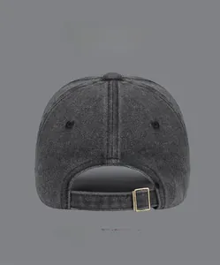 Detail of adjustable brass buckle on washed cotton baseball cap with multi-color options