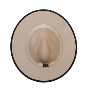 Beige wide brim fedora hat with black trim showing inner adjustable strap and lining