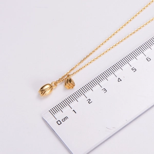 Gold-plated lotus pod and bud pendant necklace with scale measurement display