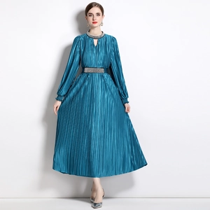 Elegant beaded pleated dress in peacock blue with a shimmering finish and jeweled belt