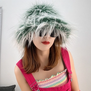 Close-up of fluffy green and white faux fur bucket hat texture and plush long hair fibers