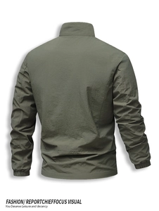 Back view of a lightweight olive green outdoor casual jacket with high collar and elastic cuffs