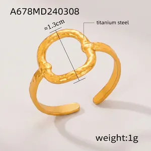 Detailed macro view of 18k gold plated titanium steel ring with hammered texture