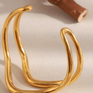 Minimalist 18K gold plated stainless steel twisted wavy open bangle for women