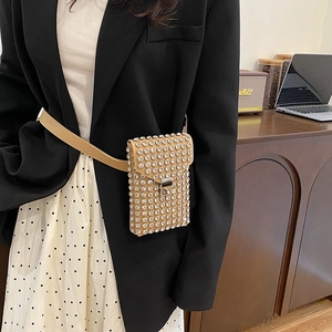 Chic khaki rhinestone belt bag with metal buckle worn by a model over a black blazer