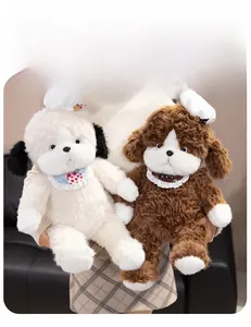 Close-up of cute plush dogs with white chef hats and red polka dot bibs detail