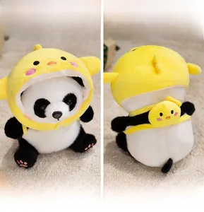 Front and back detail of soft panda plush toy wearing yellow chick hat and crossbody bag