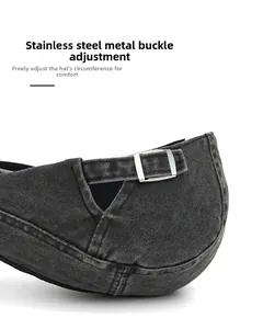Detail of adjustable stainless steel buckle and gray washed cotton strap on newsboy cap